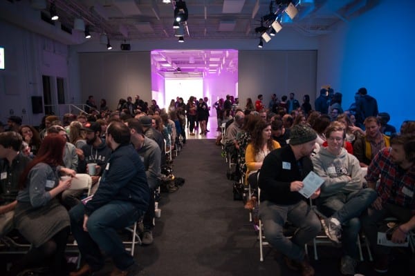 People in a room seated.